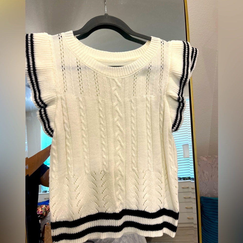 White and black ruffle sleeve sweater